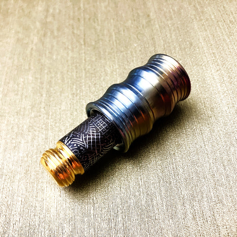 The Quantum Wave (Color-Anodized-Ti w/ Gold & Engraved Black DLC)